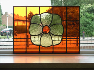 Bloem in glas in lood